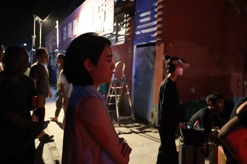 Zhao Chao pictured on the set of a Beijing short film in July 2023, where she served as line producer, leveraging over a decade of experience in film production and creative project management.